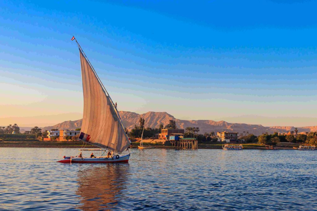 luxor-egypt-december-11-2018-felucca-boats-sailing-nile-river-luxor-egypt-traditional-egyptian-sailing-boats
